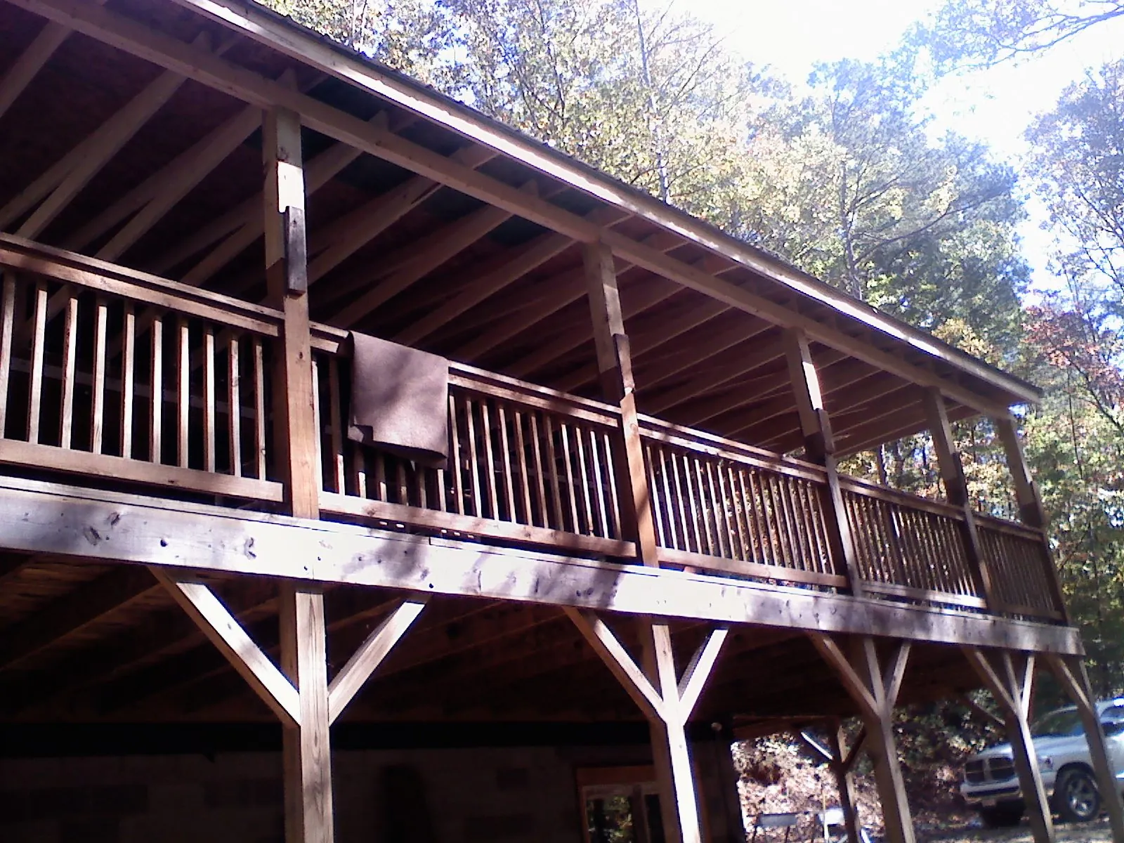 Timber framing under a new elevated porch and deck — Roof Leak Repair in Hatch by Roofing Brothers